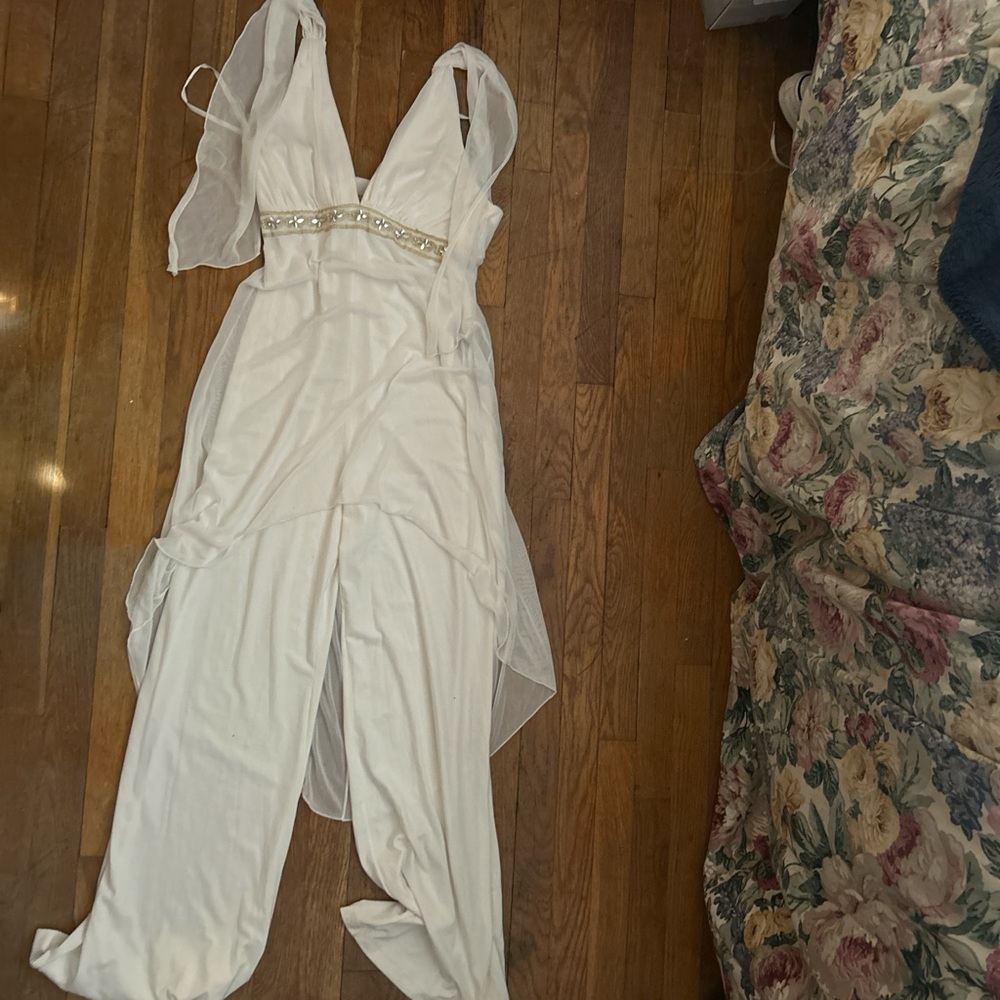 Elegant White Jumpsuit with Sheer Sleeves